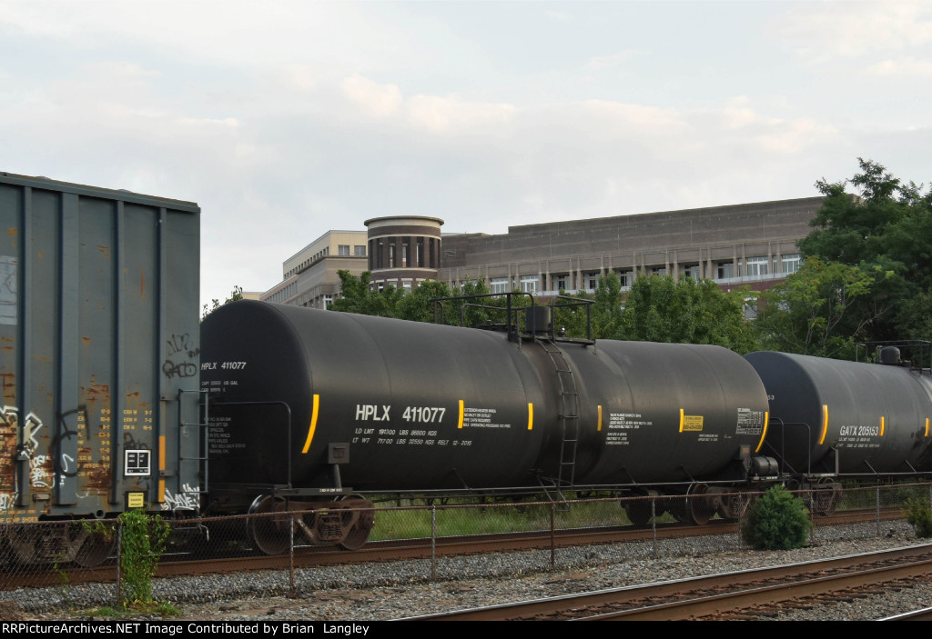 411077